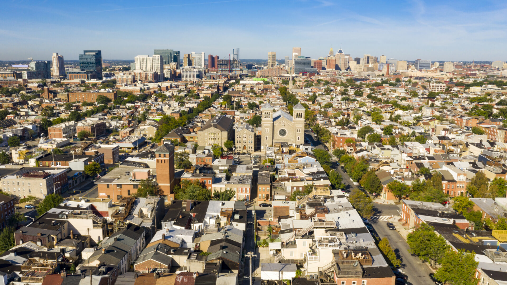 Aerial view of a bustling cityscape with diverse architecture