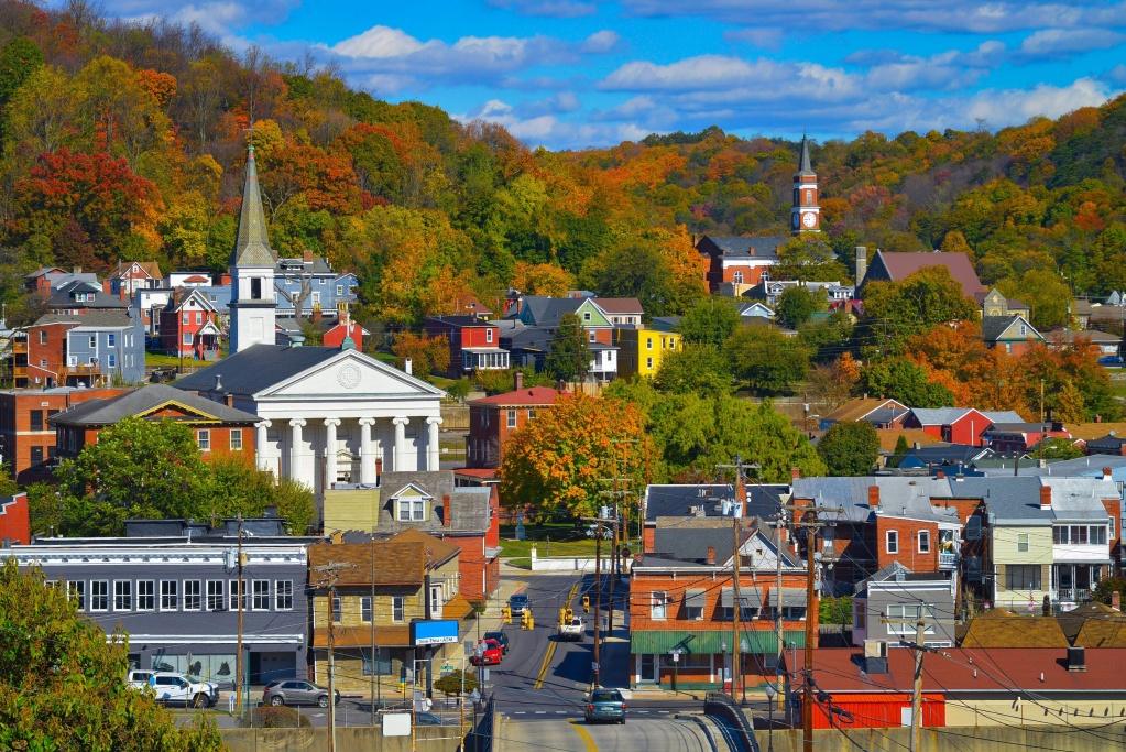 Scenic view of a vibrant small town in autumn with colorful buildings